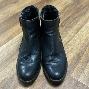 Black leather boots with zipper